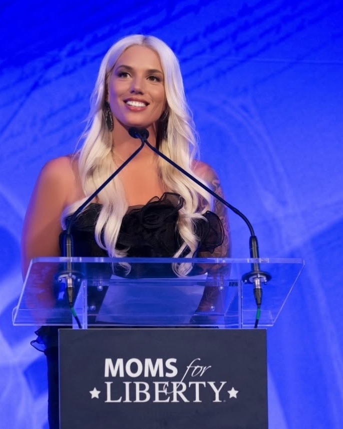 Alexandra Bougher speaking at a public advocacy event